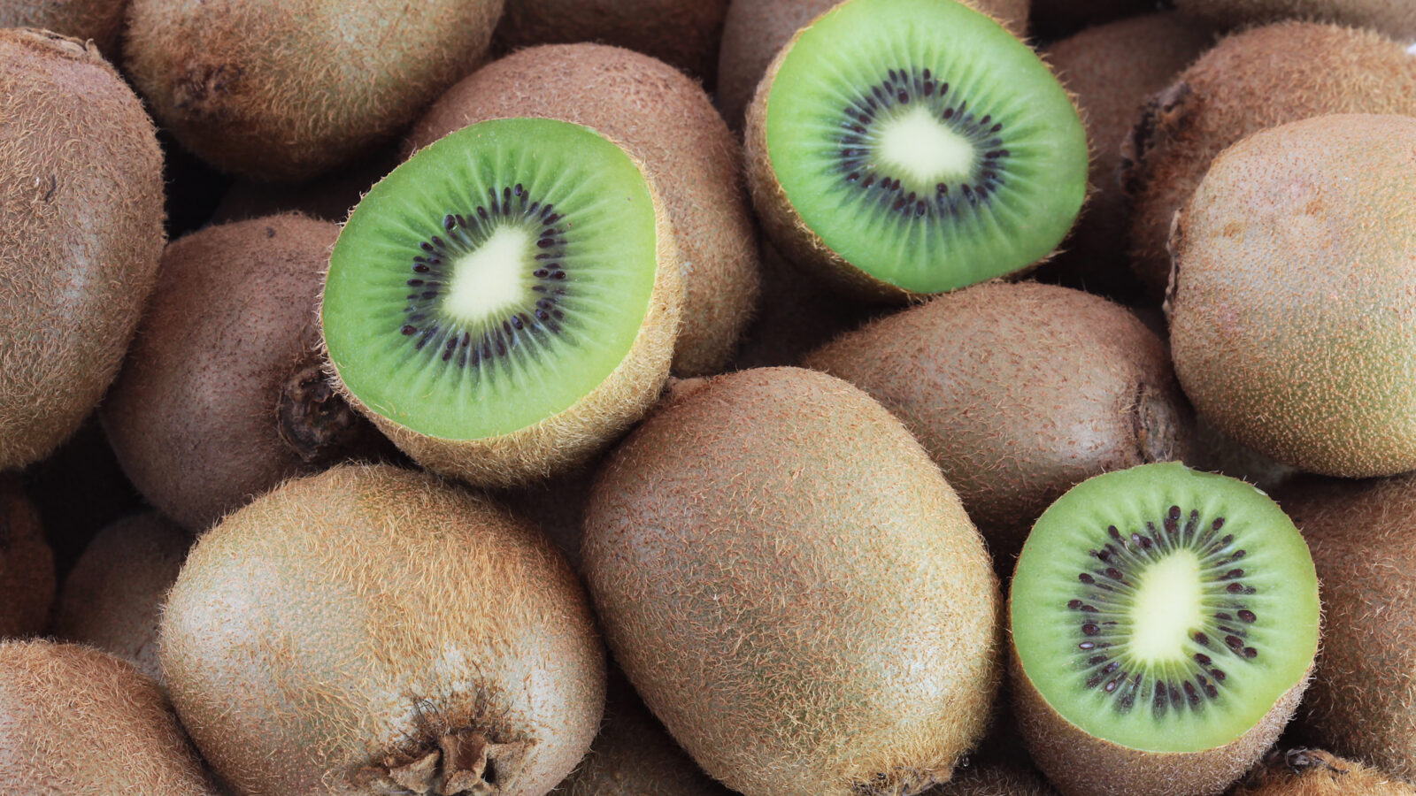 A few fresh kiwi fruits