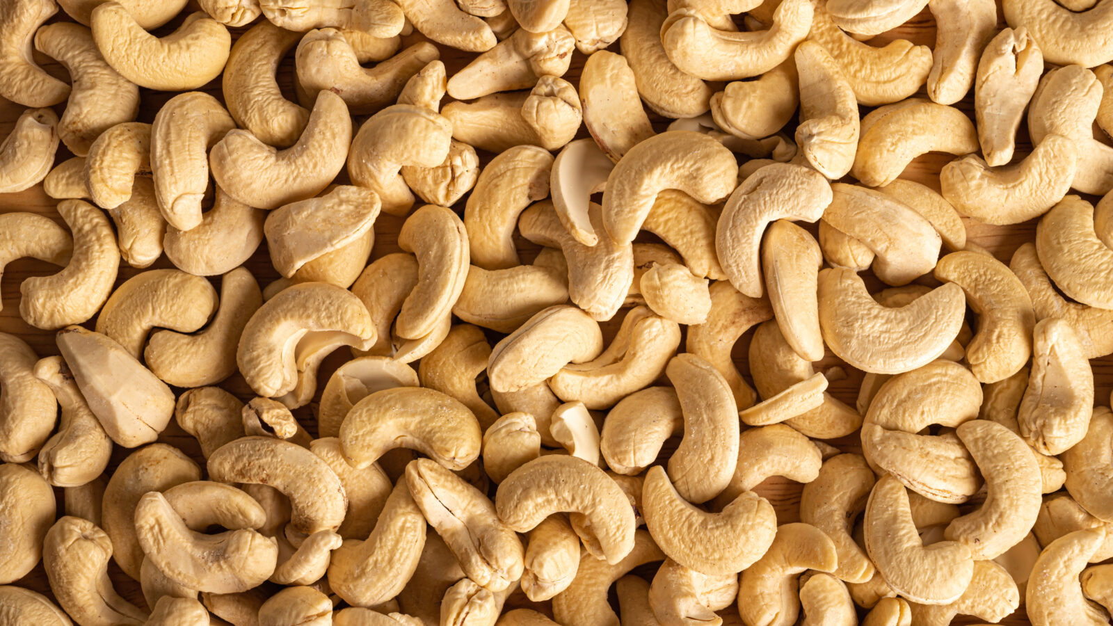 Close up of cashew nuts background. Top view